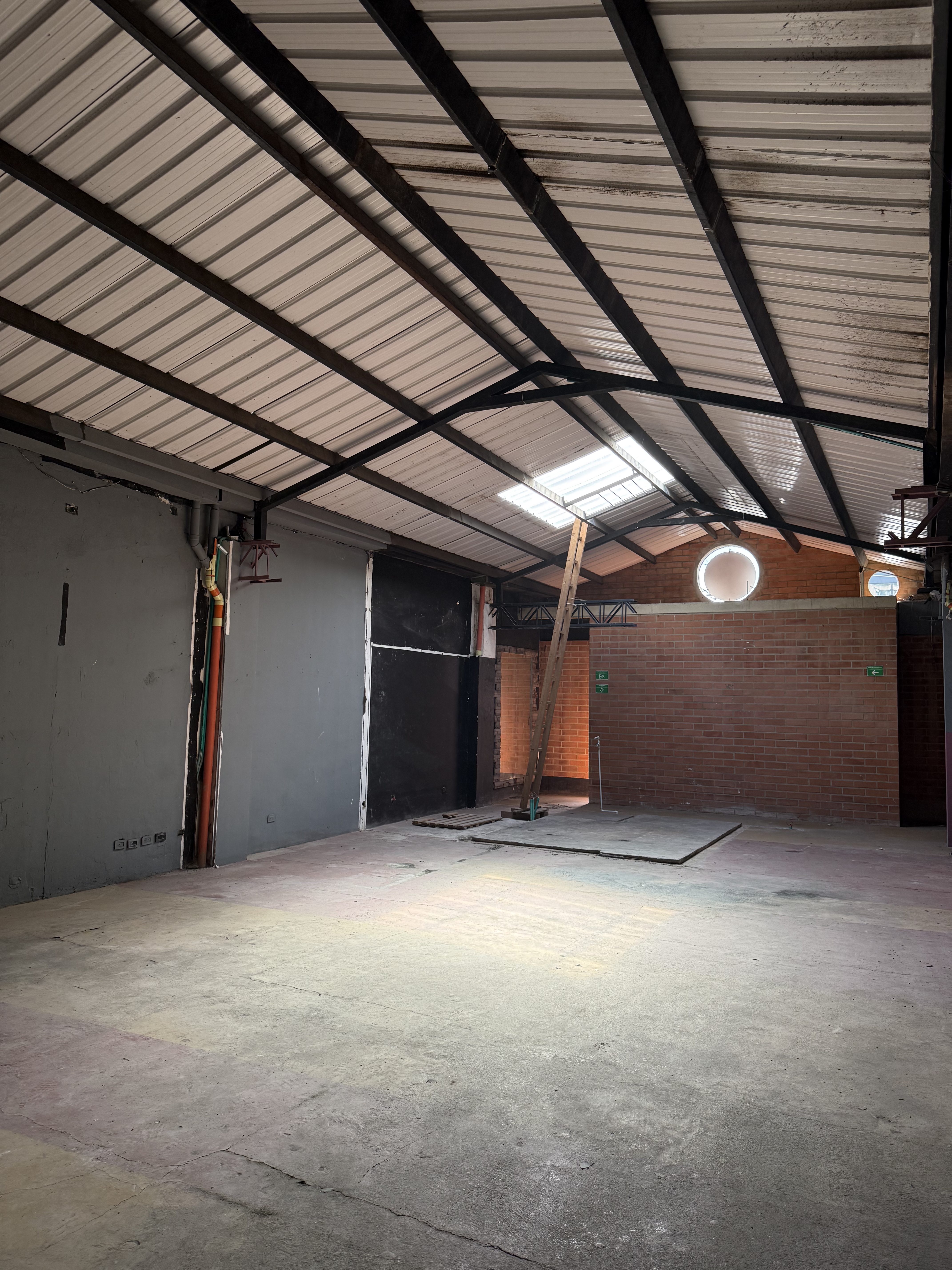 Raw warehouse space, high ceilings